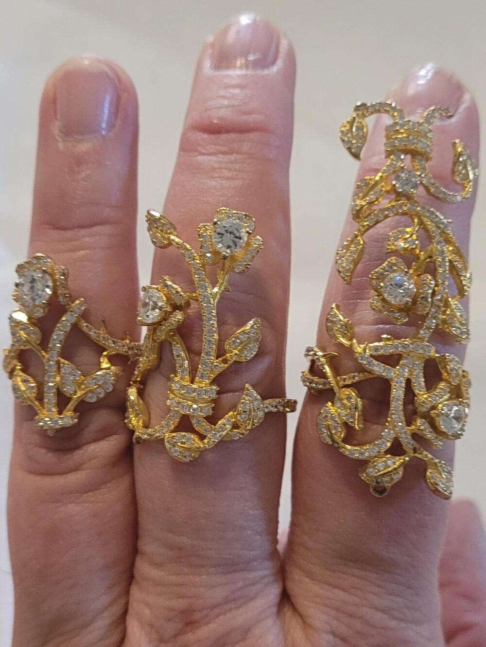 Three Ornate Gold Plated Sterling Silver Rings Set